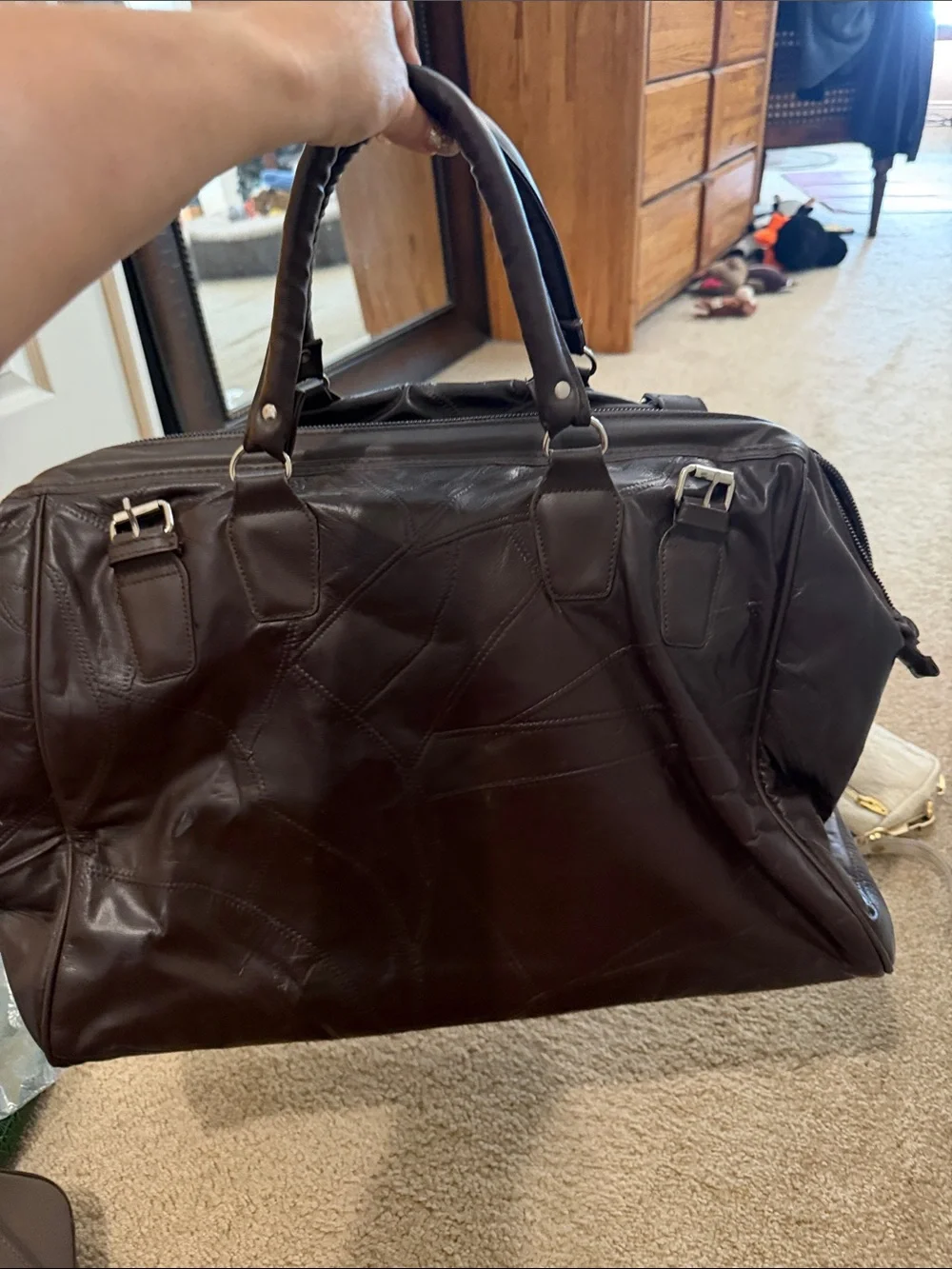 Men's Brown Leather Weekender Bag leather.